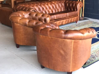 A Magnificent 4 piece genuine leather CHESTERFIELD lounge suite. (NEWLY MANUFACTURED EXCLUSIVELY)
