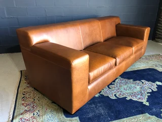 Newly manufactured 2.2m KARIBA STYLE genuine leather three seater couch, (100% FULL GRAIN ALL-ROUND)