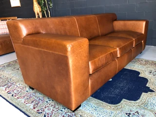 Newly manufactured 2.2m KARIBA STYLE genuine leather three seater couch, (100% FULL GRAIN ALL-ROUND)