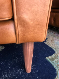 Brand new gameskin genuine leather  MID-CENTURY armchairs. (A modern streamline design) R6500 each .