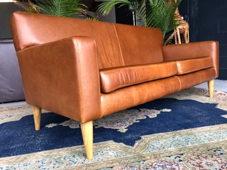 Brand new 2m  gameskin genuine leather two seater sofa. (A MODERN MID-CENTURY INSPIRED DESIGN)