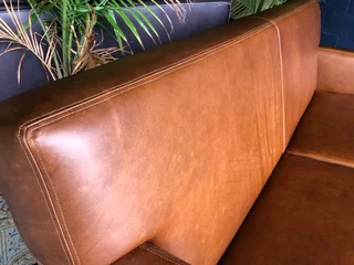 Brand new 2m  gameskin genuine leather two seater sofa. (A MODERN MID-CENTURY INSPIRED DESIGN)