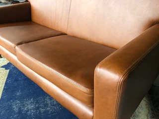 Brand new 2m  gameskin genuine leather two seater sofa. (A MODERN MID-CENTURY INSPIRED DESIGN)
