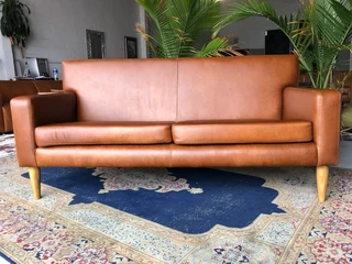 Brand new 2m  gameskin genuine leather two seater sofa. (A MODERN MID-CENTURY INSPIRED DESIGN)
