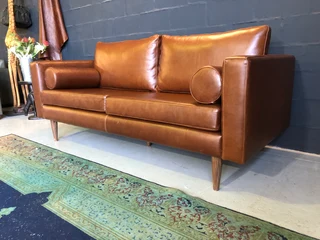 Brand New 2m Slimline Design Genuine Leather Two Seater Sofa Plus 2 X Free Leather Bolster Cushions.