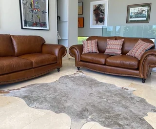 Brand New 2 piece SERENGETTI STYLE genuine leather lounge suite. (2 x 2.3m LARGE THREE SEATER SOFAS)