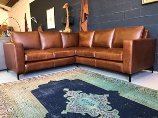 Brand new 2.5m x 2.5m gameskin genuine leather L-shape corner lounge suite, A MODERN SLIMLINE DESIGN