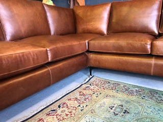 Brand new 2.5m x 2.5m gameskin genuine leather L-shape corner lounge suite, A MODERN SLIMLINE DESIGN