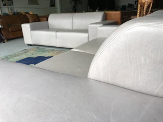 Immaculate 2pc MARCONI STYLE genuine leather lounge suite. (2 x 2.3m  THREE SEATERS) Shiduli grey.