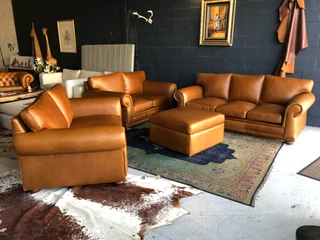 Magnificent 4 piece GATES TO AFRICA DESIGN full grain  genuine leather lounge suite. BRAND NEW.