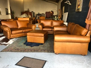 Magnificent 4 piece GATES TO AFRICA DESIGN full grain  genuine leather lounge suite. BRAND NEW.