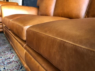 Magnificent 4 piece GATES TO AFRICA DESIGN full grain  genuine leather lounge suite. BRAND NEW.