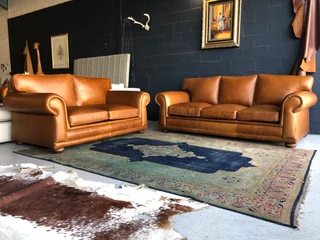 Magnificent 4 piece GATES TO AFRICA DESIGN full grain  genuine leather lounge suite. BRAND NEW.