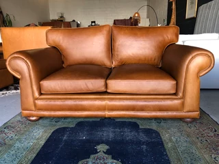 Newly manufactured 2pc  GATES TO AFRICA DESIGN genuine leather lounge suite. (2 x 1.8m TWO SEATERS)