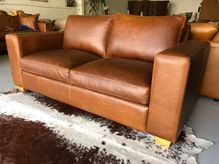 Stunning 1.8m Two seater gameskin genuine leather couch. (A  MODERN CASA DESIGN) Brand new condition