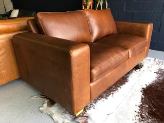 Stunning 1.8m Two seater gameskin genuine leather couch. (A  MODERN CASA DESIGN) Brand new condition