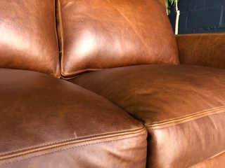 Stunning 1.8m Two seater gameskin genuine leather couch. (A  MODERN CASA DESIGN) Brand new condition