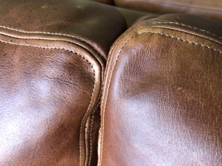 Stunning 1.8m Two seater gameskin genuine leather couch. (A  MODERN CASA DESIGN) Brand new condition