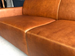 (ON PROMOTION) Large 2.5m gameskin genuine leather MARCONI STYLE three seater couch, Brand new.