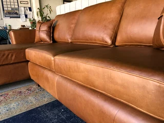 Newly manufactured (2.7m x 1.6m) full  genuine leather MODERN CASA DESIGN daybed unit, Brand new.