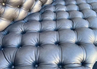 Immaculate 2.3m genuine leather cuban Chesterfield three seater sofa plus modular daybed ottoman.