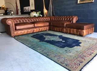 Brand new (3m x 2m) TRADITIONAL CHESTERFIELD  genuine leather corner unit plus 1m storage ottoman.