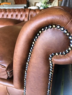 Brand new (3m x 2m) TRADITIONAL CHESTERFIELD  genuine leather corner unit plus 1m storage ottoman.