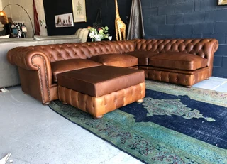 Brand new (3m x 2m) TRADITIONAL CHESTERFIELD  genuine leather corner unit plus 1m storage ottoman.