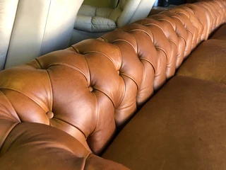 Magnificent &amp; massive (3.2m x 3.2m) gameskin genuine leather CHESTERFIELD corner lounge suite.