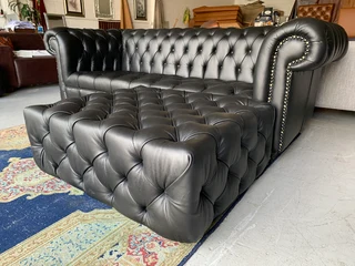 Brand new 2.2m genuine leather Chesterfield three seater sofa plus modular deep buttoned ottoman.