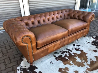 (ON PROMOTION) Brand new genuine leather 2.2m Chesterfield three seater sofa. (100% FULL GAMESKIN)