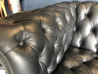 Brand new 2.2m genuine leather full deep buttoned Chesterfield three seater sofa. (CRACKLE BLACK)