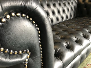 Brand new 2.2m genuine leather full deep buttoned Chesterfield three seater sofa. (CRACKLE BLACK)
