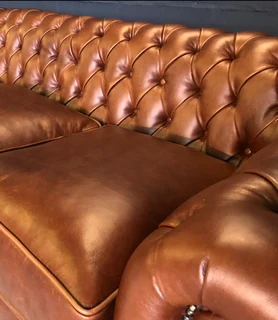 Newly manufactured 2.2m full grain genuine leather three seater sofa. (A CLASSIC BRITISH DESIGN)