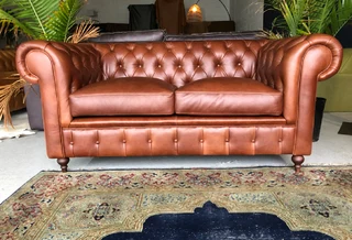 A Elegant 1.8m  genuine Leather Chesterfield Two Seater Sofa. Brand New. (with Piping Detailing)