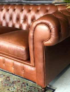 Brand new 2.2m  VINTAGE genuine leather Chesterfield three seater sofa. (PIPING FRONT-END DETAILING)