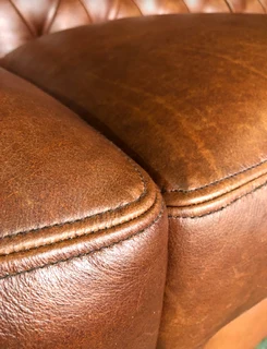 Brand new 2.2m  VINTAGE genuine leather Chesterfield three seater sofa. (PIPING FRONT-END DETAILING)