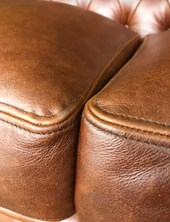 Brand new 2.2m  VINTAGE genuine leather Chesterfield three seater sofa. (PIPING FRONT-END DETAILING)