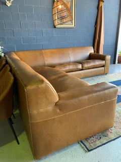 (ON PROMOTION) Extremely large (3m x 3m) KARIBA STYLE genuine leather L-shape corner lounge suite.