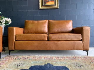 Brand new 1.9m gameskin genuine leather CONTEMPORARY STYLE two seater sofa.