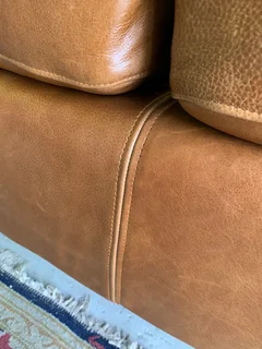 Brand new 1.9m gameskin genuine leather CONTEMPORARY STYLE two seater sofa.