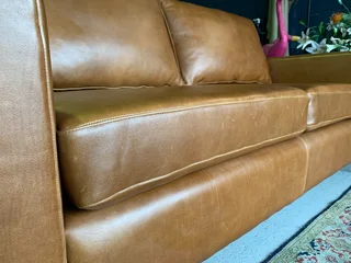 Brand new 1.9m gameskin genuine leather CONTEMPORARY STYLE two seater sofa.