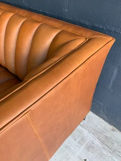 A sophisticated 2 piece full  genuine leather lounge suite. (A DESIGN SET YOU APART FROM THE REST)