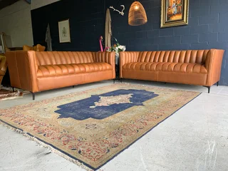 A Sophisticated 2 Piece Full  genuine Leather Lounge Suite. (a Design Set You Apart From The Rest)