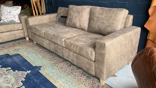 A sophisticated 3pc Zambezi genuine leather lounge suite 2 x THREE SEATERS plus 1 x  STORAGE OTTOMA