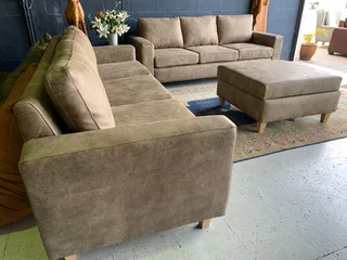 A sophisticated 3pc Zambezi genuine leather lounge suite 2 x THREE SEATERS plus 1 x  STORAGE OTTOMA