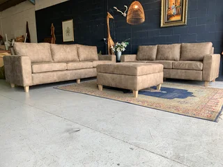 A Sophisticated 3pc Zambezi Genuine Leather Lounge Suite 2 X Three Seaters Plus 1 X  storage Ottoma