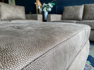 A sophisticated 3pc Zambezi genuine leather lounge suite 2 x THREE SEATERS plus 1 x  STORAGE OTTOMA