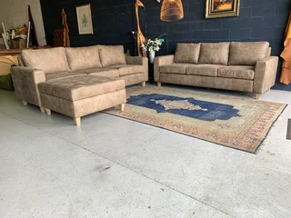 A sophisticated 3pc Zambezi genuine leather lounge suite 2 x THREE SEATERS plus 1 x  STORAGE OTTOMA