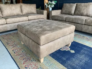 A sophisticated 3pc Zambezi genuine leather lounge suite 2 x THREE SEATERS plus 1 x  STORAGE OTTOMA